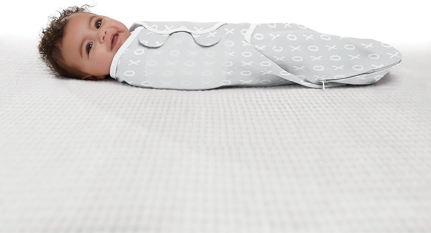 imageSwaddleMe by Ingenuity Easy Change Baby Swaddle in Size SmallMedium 03 Months 714 Pounds 3Pack with Easy Change Zipper Snow LeopardKiss Ya