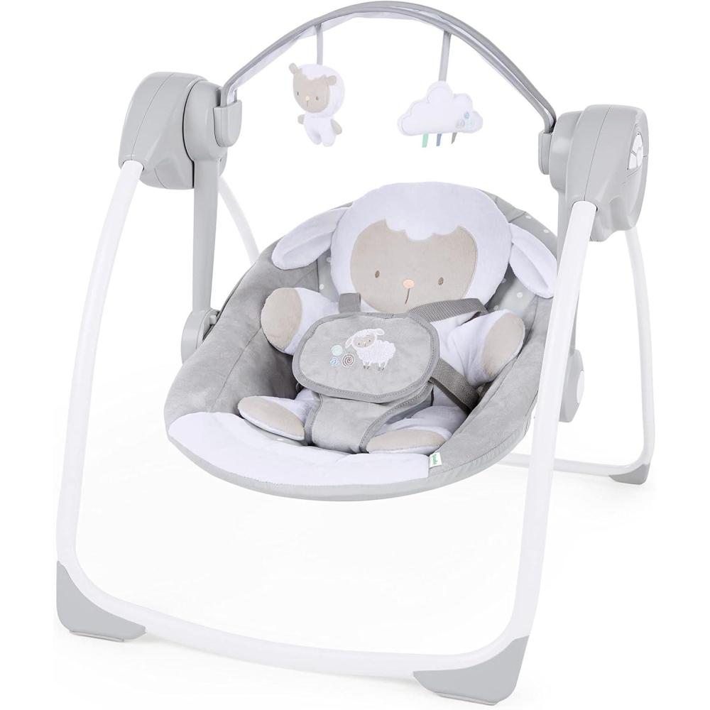 imageIngenuity Soothe n Delight Compact Portable 6Speed Plush Baby Swing with Music Folds Easy 09 Months 620 lbs Cozy KingdomCuddle Lamb