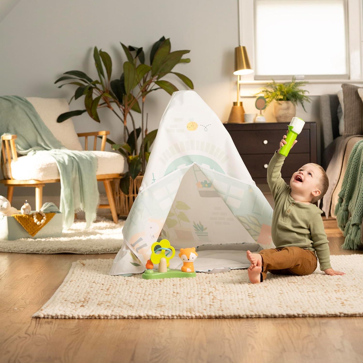 imageIngenuity TummytoToes 6in1 Milestone Center Play Gym Foldable Mat Music and Nature Sounds Lights Activity Jumper Table Playhouse for Ages 048 Months
