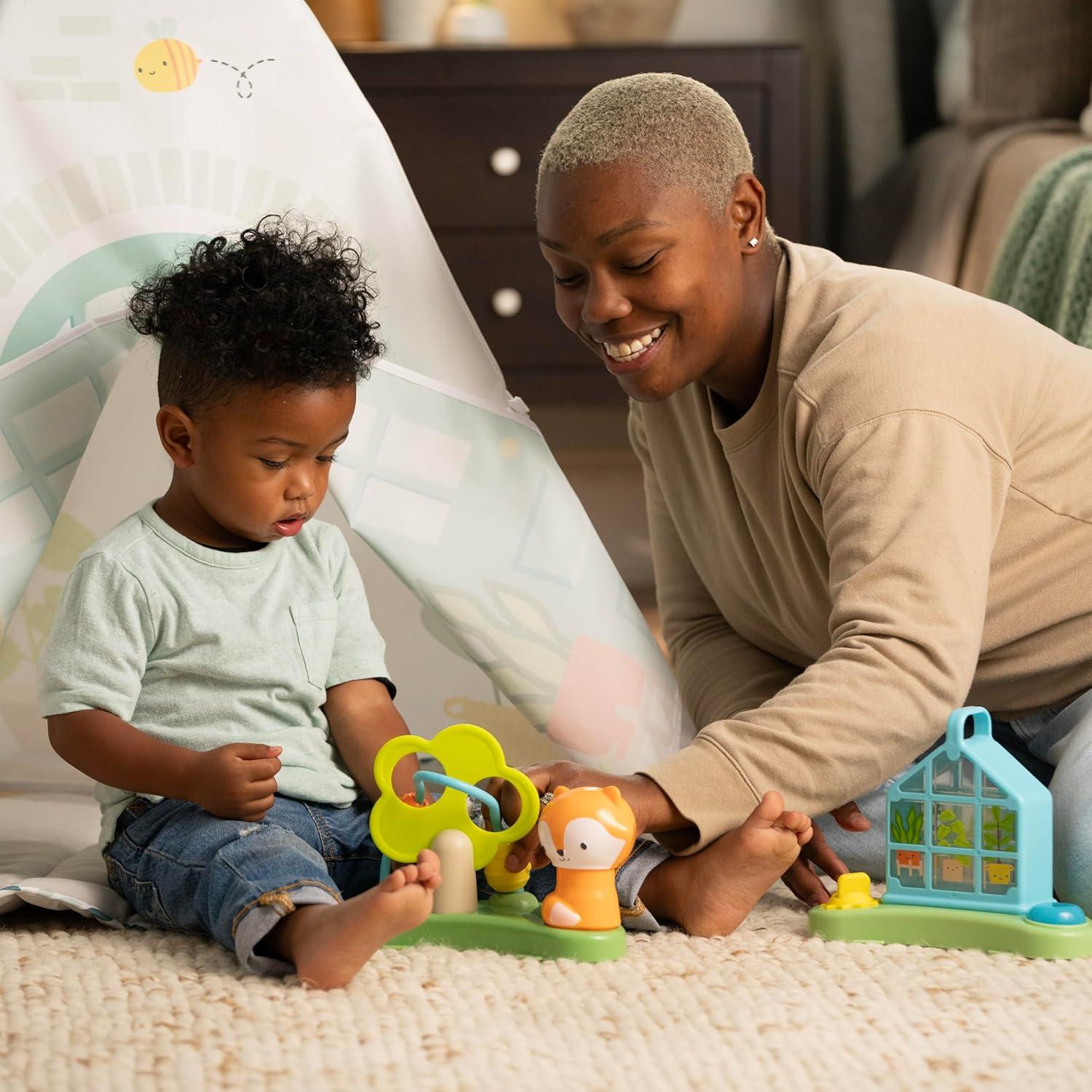 imageIngenuity TummytoToes 6in1 Milestone Center Play Gym Foldable Mat Music and Nature Sounds Lights Activity Jumper Table Playhouse for Ages 048 Months