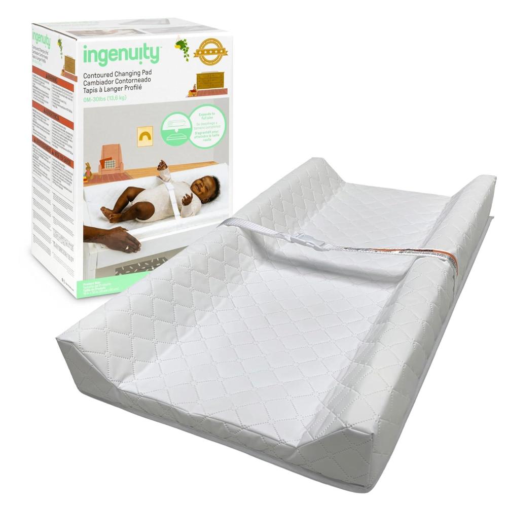 imageIngenuity Contoured Changing Pad  Includes Waterproof Changing Liner and Safety Fastening Strap with QuickRelease BuckleContoured Pad  Reduced Waste Packaging