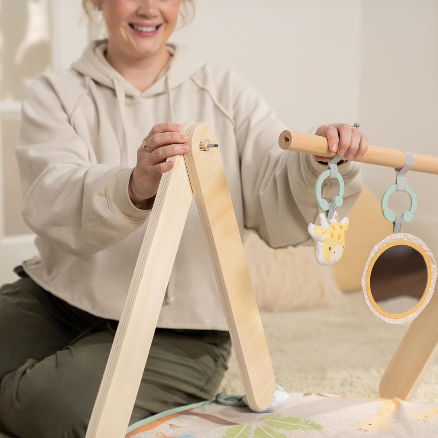 image:imageIngenuity One Bar Baby Play Gym Sunny Nest Foldable 3in1 Activity Gym amp Play Mat with Toy Bar Sensory Toys Tummy Time Play NewbornNeutral